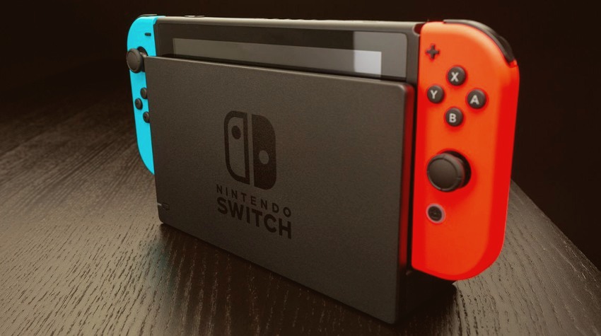 Игровая приставка Nintendo Switch на столе в подставке